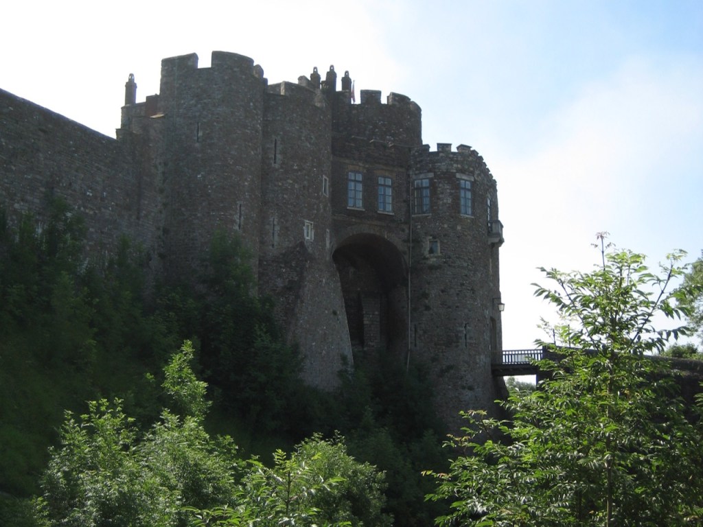Dover Castle, dark and imposing against a bright summer sky